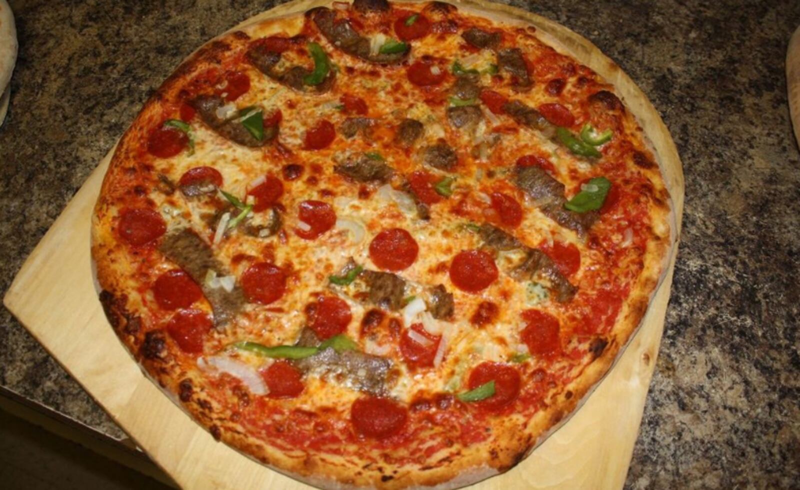 New York-style pizzas are served up at Fratelli's along with calzones, chicken parmesan meals, eggplant parmesan meals, pasta dinners, salads and sandwiches. CONTRIBUTED