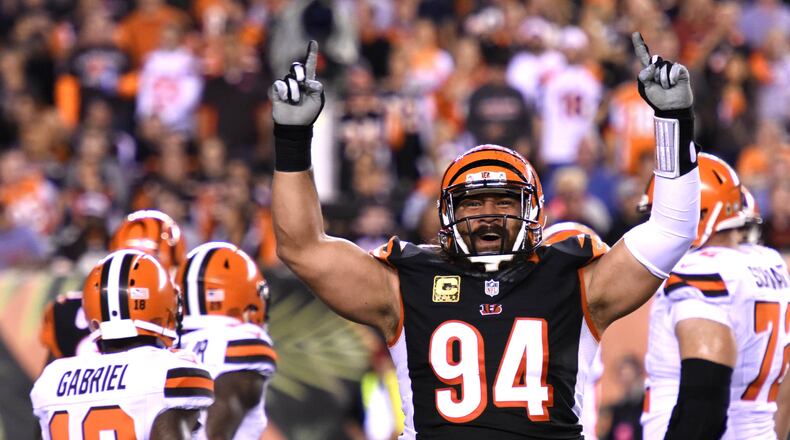 The Cincinnati Bengals defensive tackle Domata Peko gets the crowd pumped up as they host the Cleveland Browns Thursday, Nov. 5 at Paul Brown Stadium in Cincinnati. NICK GRAHAM/STAFF