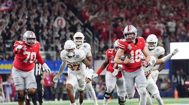 FILE - Ohio State quarterback Will Howard (18) runs against Texas during the second half of the Cotton Bowl College Football Playoff semifinal game, Jan. 10, 2025, in Arlington, Texas. (AP Photo/Julio Cortez, File)