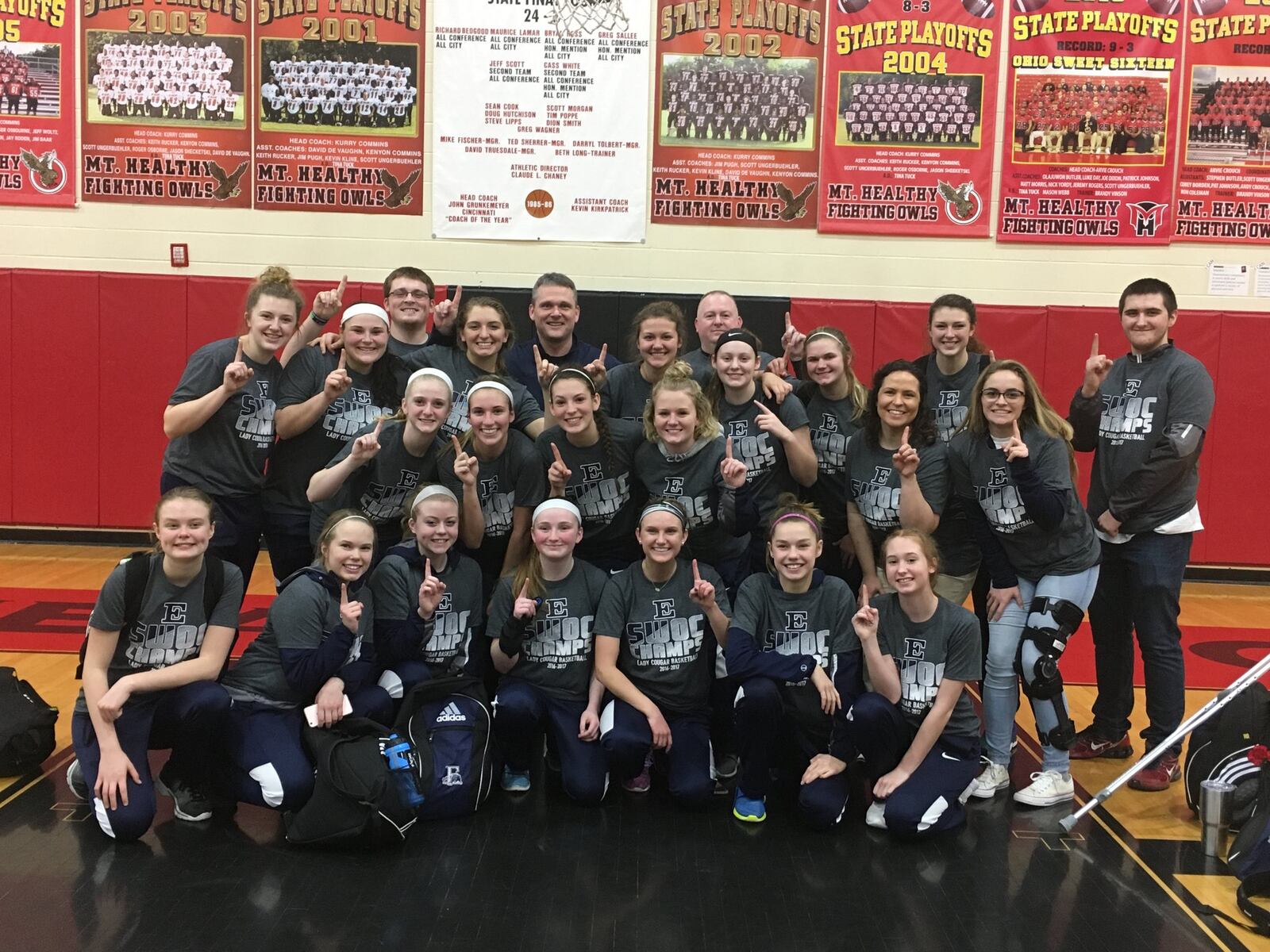 Edgewood’s girls basketball team poses for a group photo after defeating host Mt. Healthy 37-24 on Saturday, clinching the outright Southwest Ohio Conference championship. RICK CASSANO/STAFF