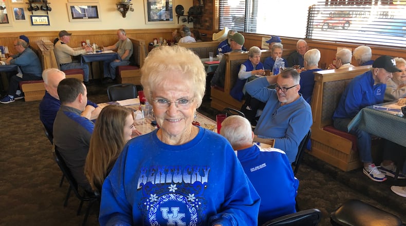 Hilda Ratliff, the longtime owner of Mom's Restaurant in Franklin, shows off her blue gravy that she makes every year to celebrate the University of Kentucky men's basketball team playing in the NCAA Tournament. A large crowd of UK fans gathered at Mom's Wednesday morning. RICK McCRABB/STAFF