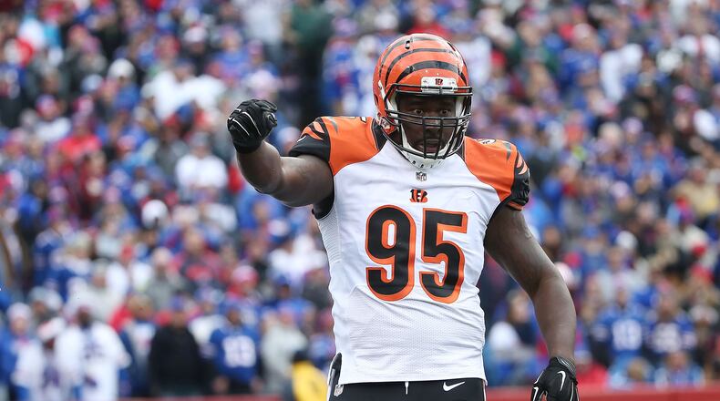 ORCHARD PARK, NY - OCTOBER 18: Wallace Gilberry #95 of the Cincinnati Bengals celebrates after getting a sack on EJ Manuel #3 of the Buffalo Bills during the first half at Ralph Wilson Stadium on October 18, 2015 in Orchard Park, New York. (Photo by Tom Szczerbowski/Getty Images)
