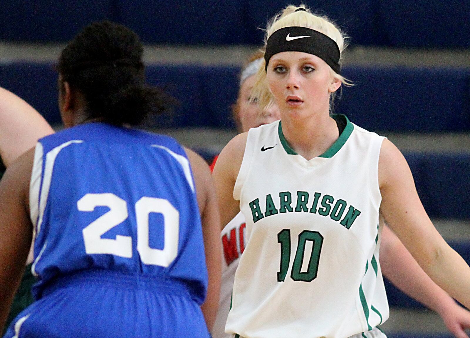 Harrison’s Kaylee Schulte keeps her eyes on Middletown Christian’s Aubriana Bellard during the inaugural All-Butler County All-Star girls basketball game at the Hamilton Athletic Center on Saturday. CONTRIBUTED PHOTO BY E.L. HUBBARD