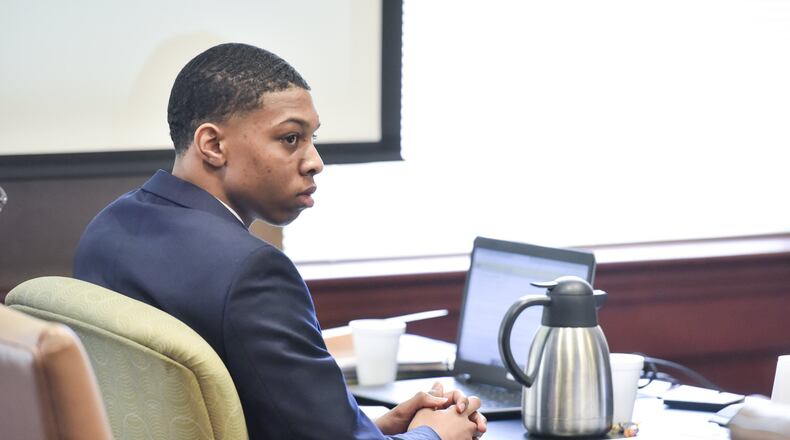 Kameron Tunstall, charged in the shooting death of 13-year-old Jararius Gilbert in August 2018, sits during the third day of his trial Wednesday, April 24, 2019 in Butler County Common Pleas Court in Hamilton. NICK GRAHAM/STAFF