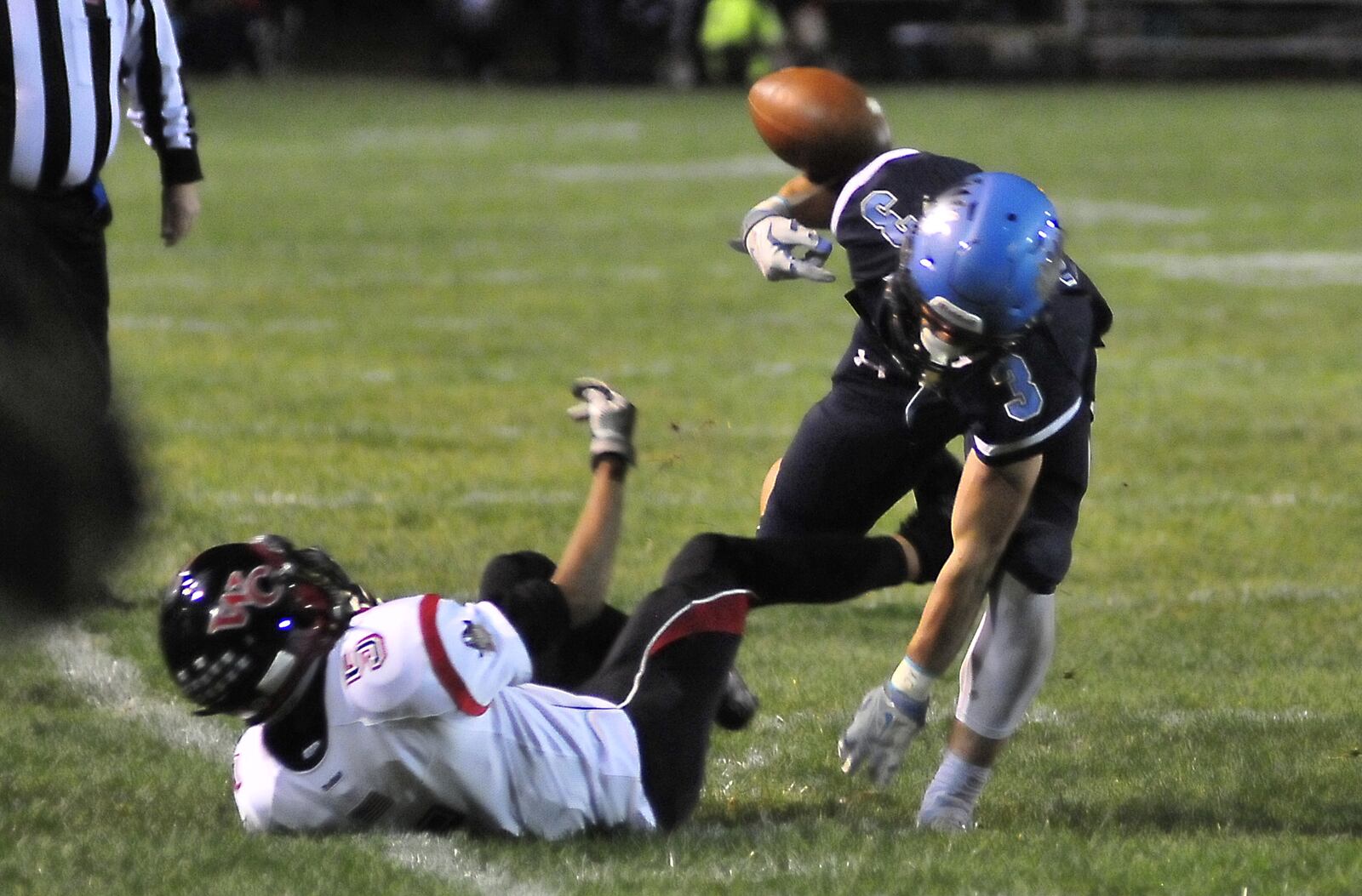 Skyhawk wide receiver Brandon Easterling (3) fights for the recovery of a fumble  at  Fairborn's High School's  Buschemeyer Field, Friday evening October 21, 2016 where the Skyhawk's host the West Carrollton Pirates 
102116hawkWC4
CHARLES CAPERTON/PHOTO