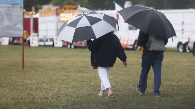 Rain and storms caused the early closure Friday of the Ohio Challenge hot air balloon festival in Middletown. GREG LYNCH/STAFF
