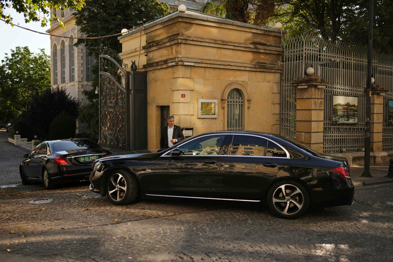 Cars, which are believed to carry European diplomats, enter the Iranian consulate ahead of a meeting with Iranian counterparts for talks over Tehran's nuclear program, in Istanbul, Turkey, Friday, July 25, 2025. (AP Photo/Francisco Seco)
