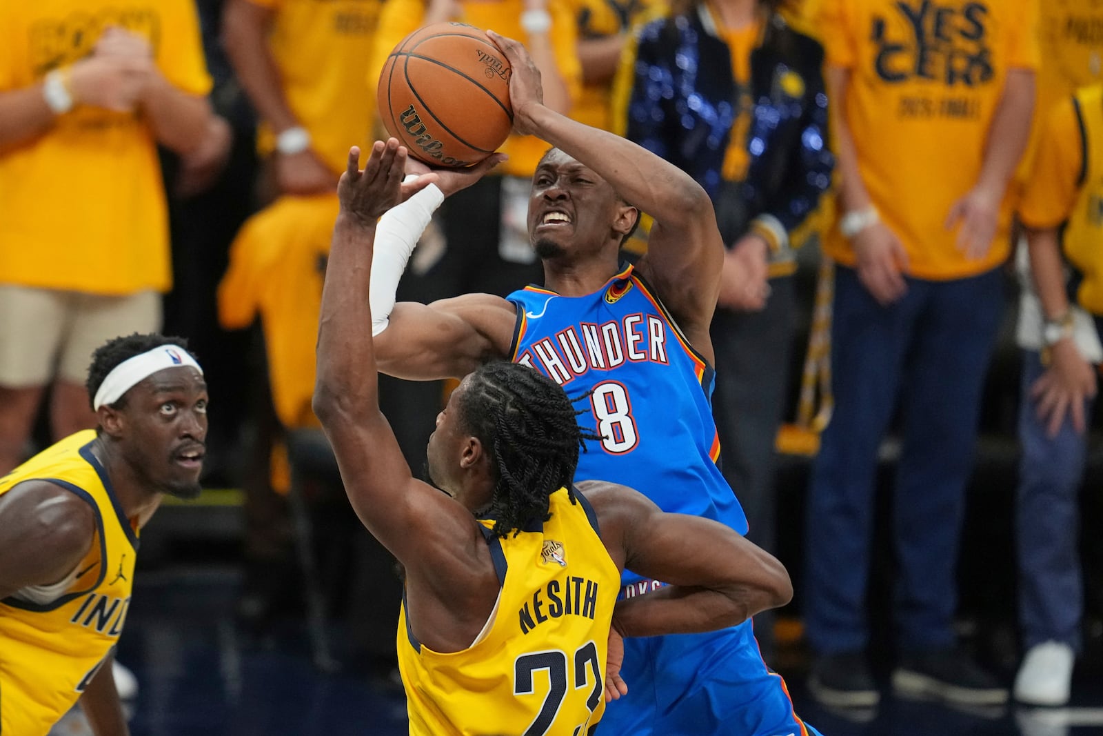 Oklahoma City Thunder forward Jalen Williams (8) shoots over Indiana Pacers forward Aaron Nesmith (23) during the first half of Game 6 of the NBA Finals basketball series, Thursday, June 19, 2025, in Indianapolis. (AP Photo/Michael Conroy)