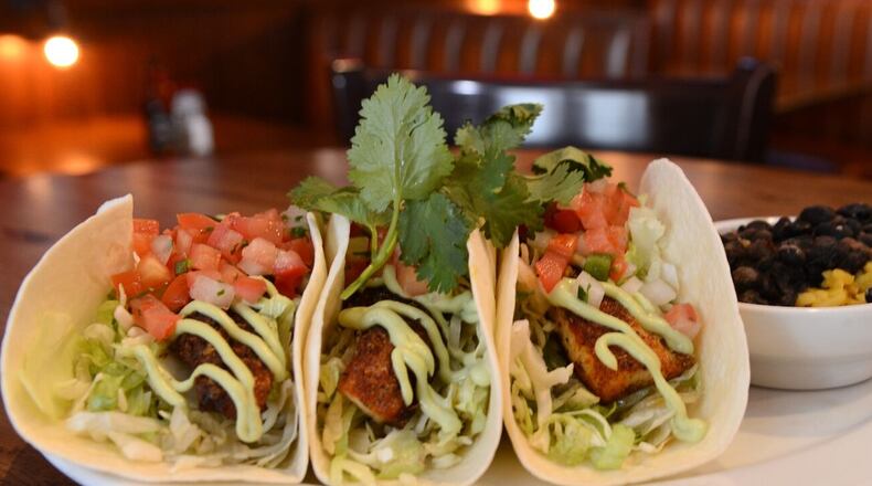 Columbus-based Rusty Bucket Restaurant & Tavern, which operates a restaurant in front of the Dayton Mall in Miami Twp.,  has hit the “refresh” button on some of its most popular menu items , including Baja Tacos, and has also launched online reservations.
