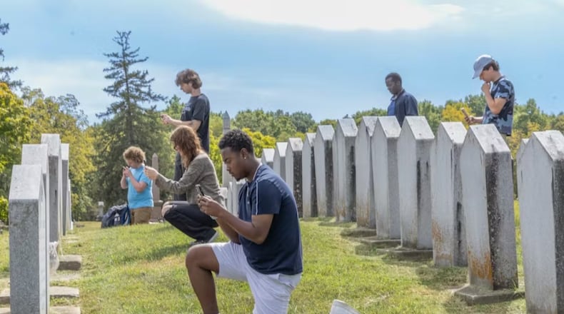 Miami University students in the author’s advanced GIS course collect headstone data. MIAMI COMMUNICATIONS/CONTRIBUTED