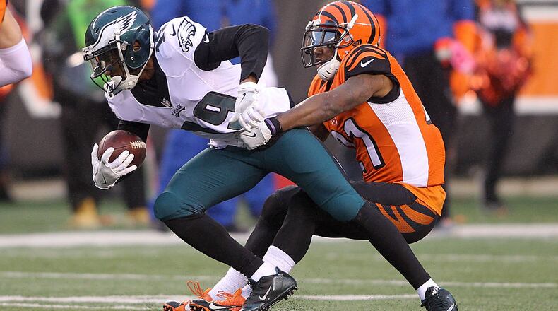 CINCINNATI, OH - DECEMBER 4: Paul Turner #19 of the Philadelphia Eagles is tackled by Darqueze Dennard #21 of the Cincinnati Bengals during the fourth quarter at Paul Brown Stadium on December 4, 2016 in Cincinnati, Ohio. Cincinnati defeated Philadelphia 32-14. (Photo by John Grieshop/Getty Images)