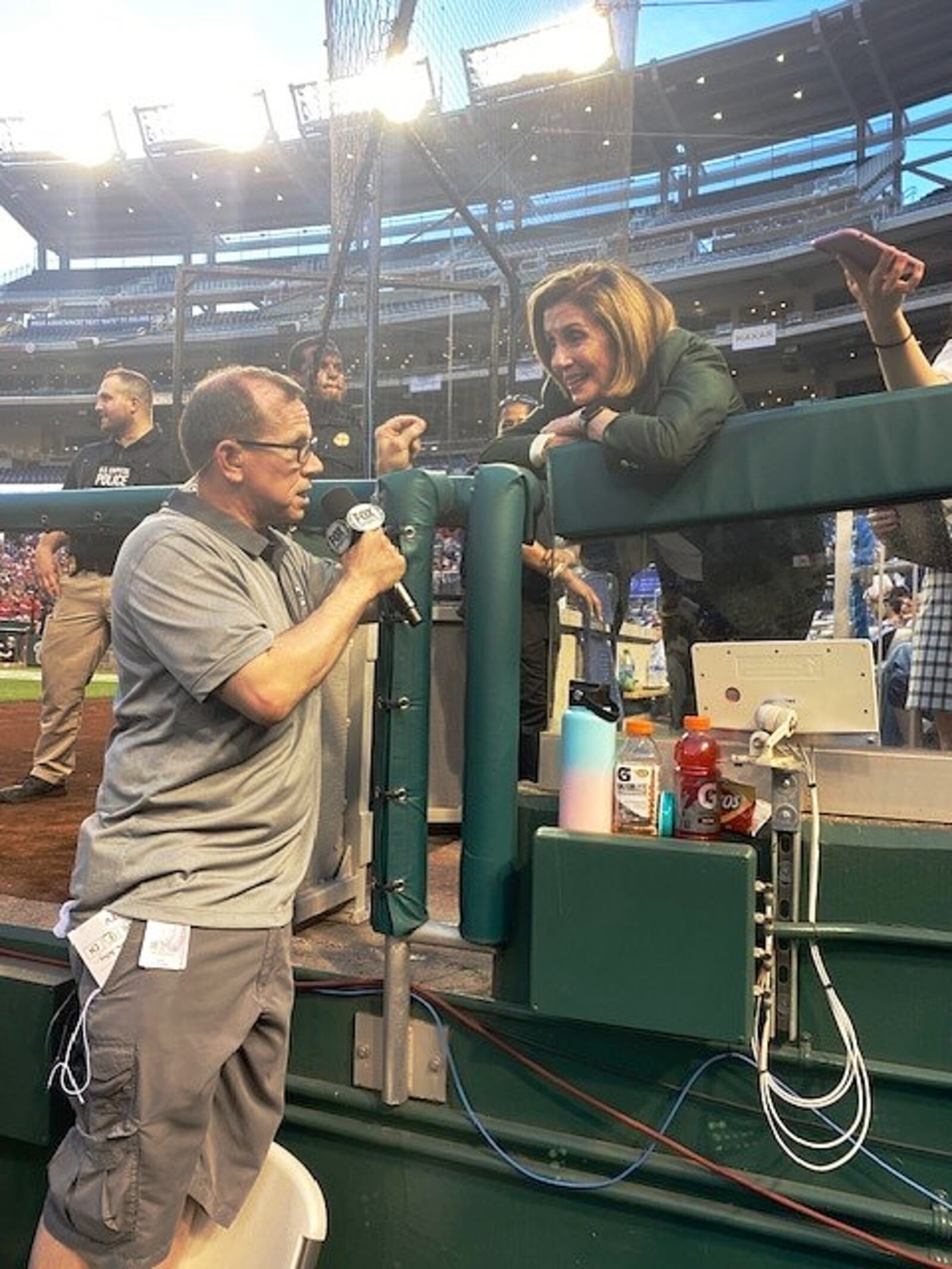 Butler County native Chad Pergram, Fox News’ Senior Congressional Correspondent, interviews then-Speaker of the House Nancy Pelosi during a Congressional Baseball Game in Washington, D.C. Pergram will be in the broadcast booth for the first time for tonight's game. CONTRIBUTED PHOTO