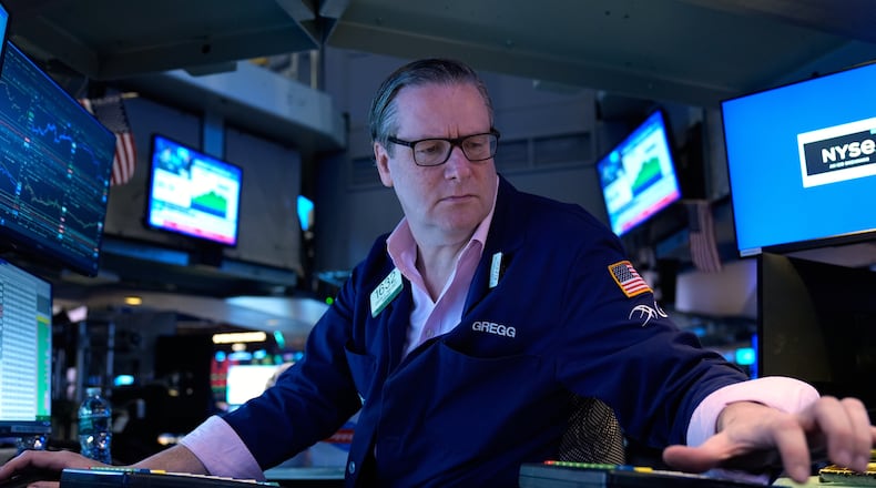 Gregg Maloney works on the floor at the New York Stock Exchange in New York, Tuesday, March 10, 2026. (AP Photo/Seth Wenig)