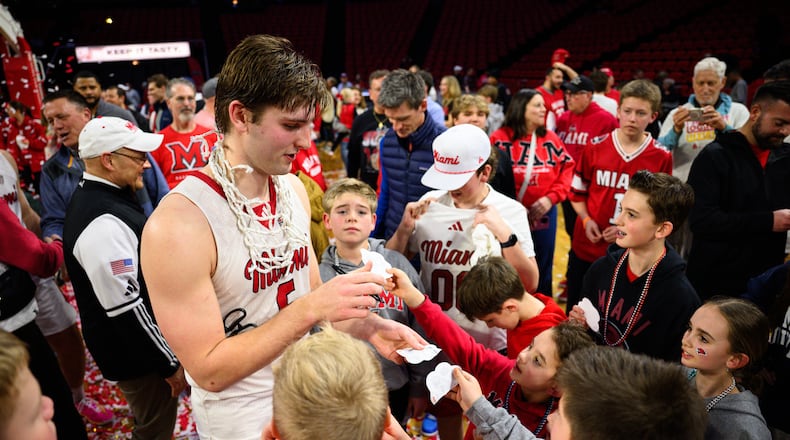 Miami University's Peter Suder signs autographs for fans after the RedHawks beat Toledo 74-72 in Mid-American Conference action on Tuesday, March 3, 2026 at Millett Hall. Miami clinched its first MAC regular season crown since 2005-06. JEREMY MILLER / CONTRIBUTED PHOTO
