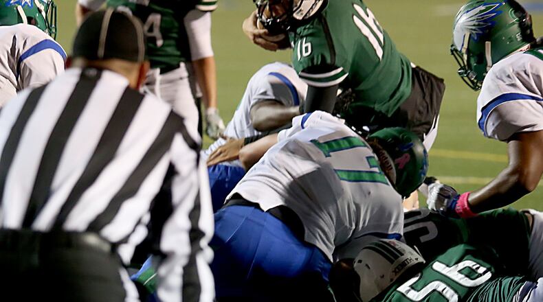 Badin quarterback Jordan Flaig is stopped at the goal line by Chaminade Julienne’s defense during their game at Virgil Schwarm Stadium in Hamilton last weekend. CONTRIBUTED PHOTO BY E.L. HUBBARD