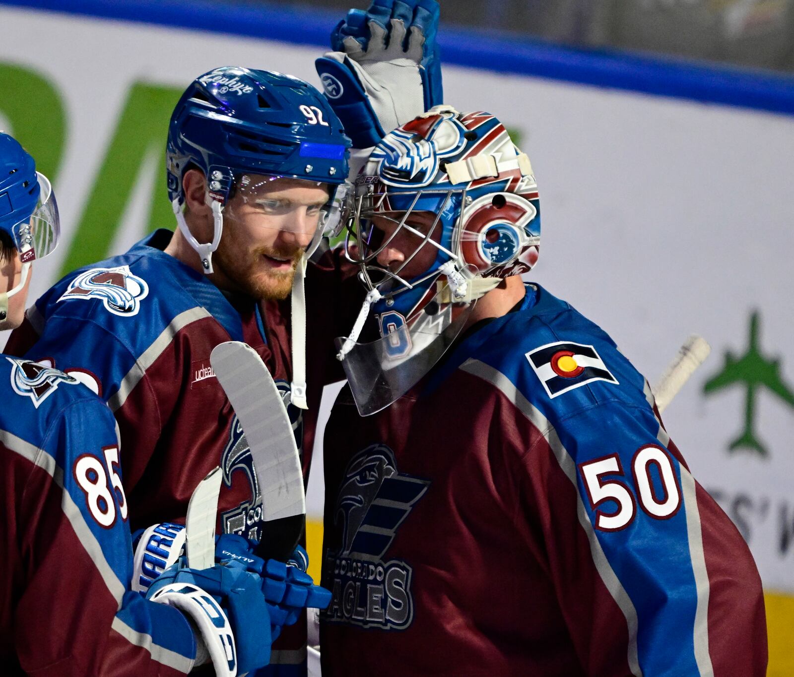 Colorado Eagles forward Gabriel Landeskog, left, congratulates goalie Trent Minor after the Eagles defeated the Henderson Silver Kings in a minor league hockey game Friday, April 11, 2025, in Loveland, Colo. (Andy Cross/The Denver Post via AP)