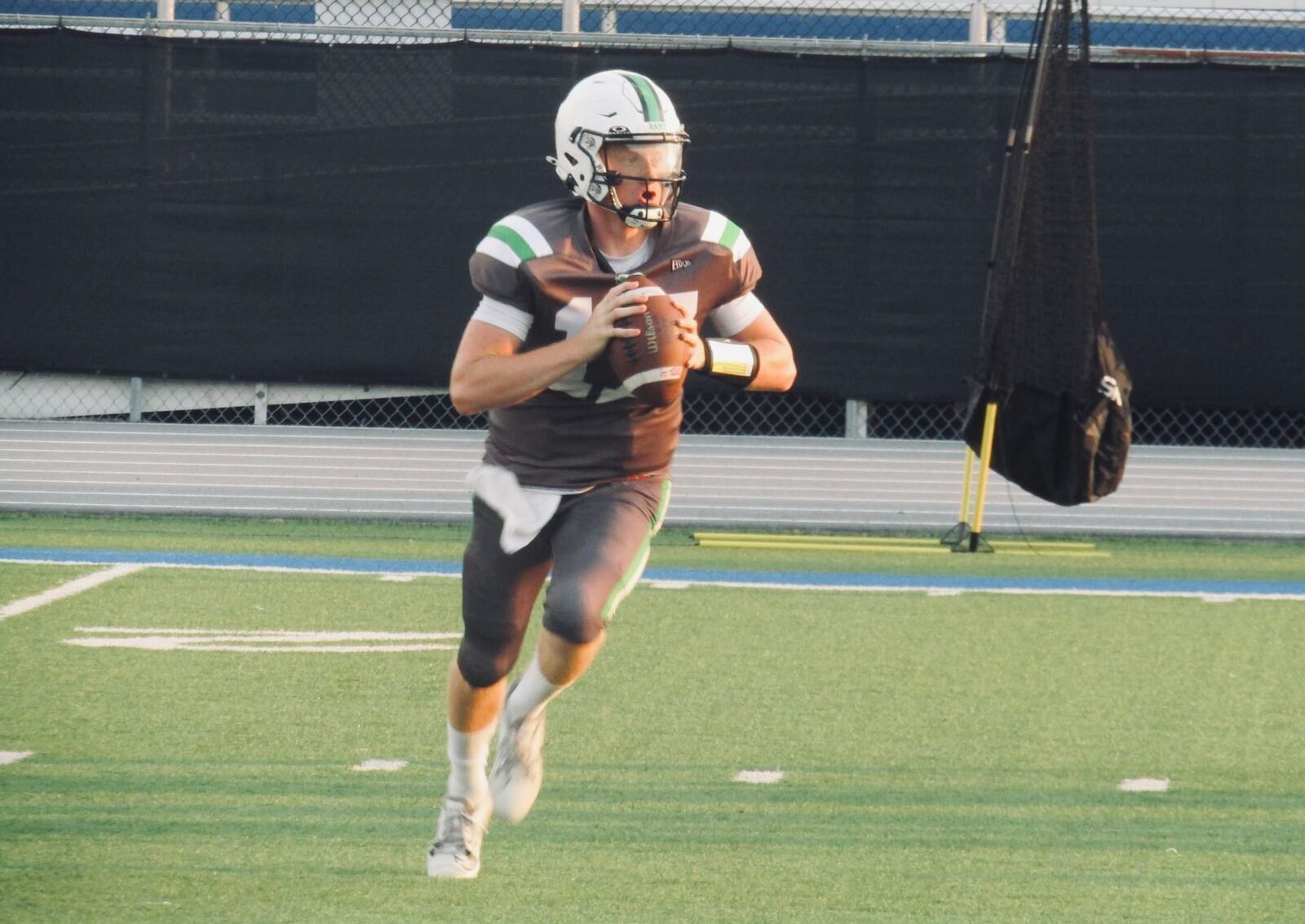 Badin quarterback Colt Emerson scrambles against St. Francis De Sales last week. Brian Paxton/CONTRIBUTED