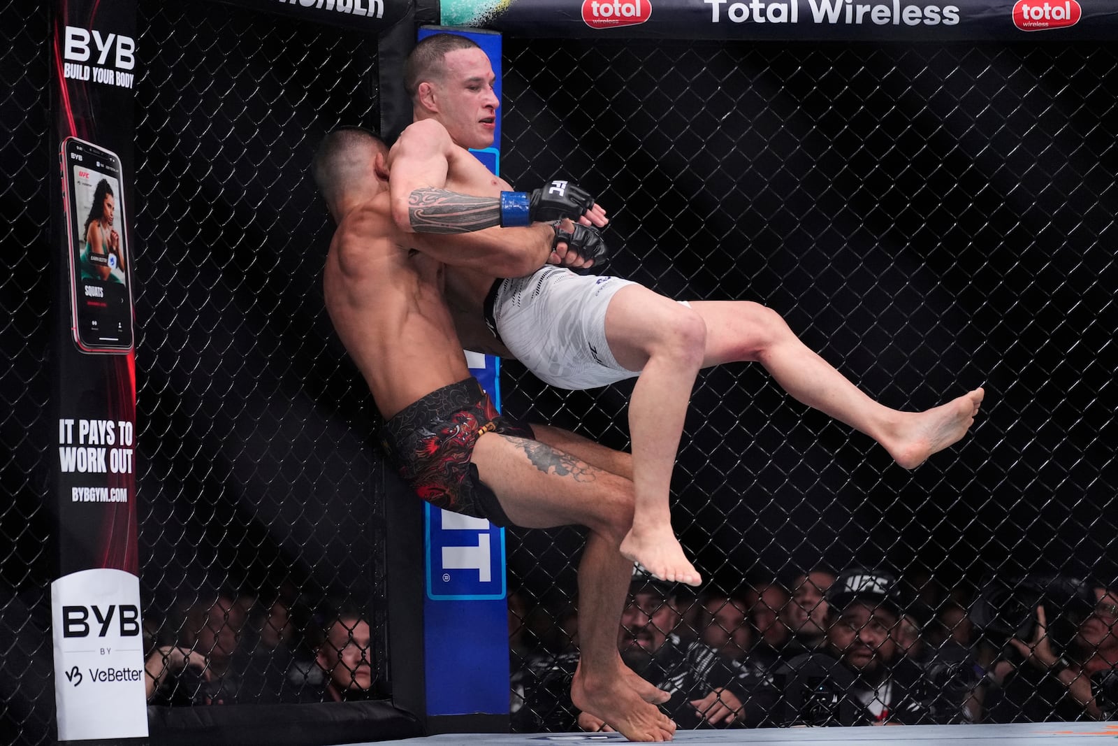 Alexandre Pantoja takes down Kai Kara-France in a flyweight title fight at UFC 317, Saturday, June 28, 2025, in Las Vegas. (AP Photo/John Locher)