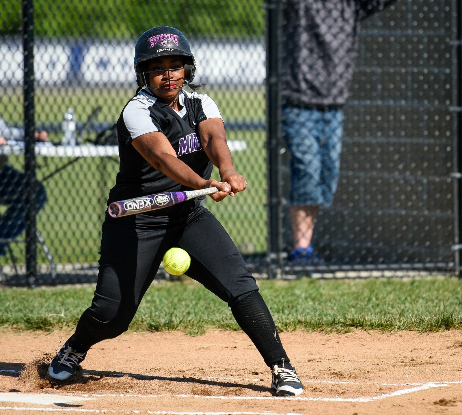 Middletown’s Eboney Sinclair gets a piece of the ball during a Division I sectional opener at Edgewood on Monday. NICK GRAHAM/STAFF