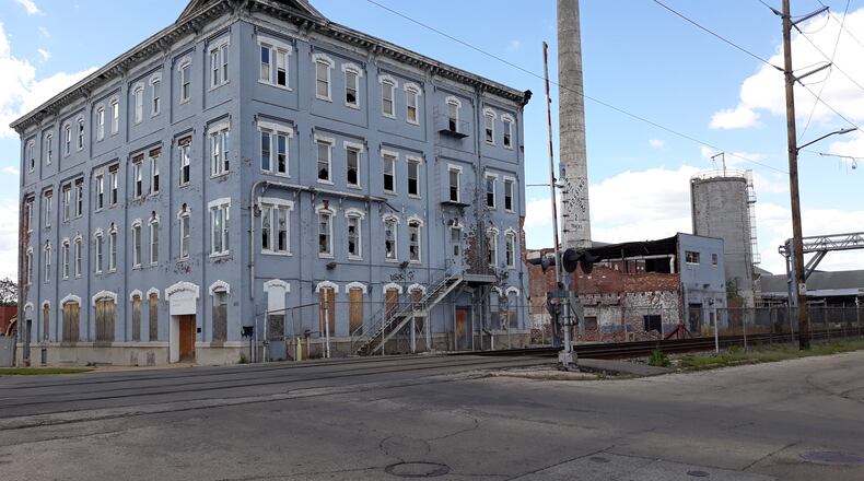 The former Beckett Paper building at 400 Dayton St. was the first and only vacant commercial property Hamilton registered since its program launched in early 2020. MIKE RUTLEDGE/STAFF