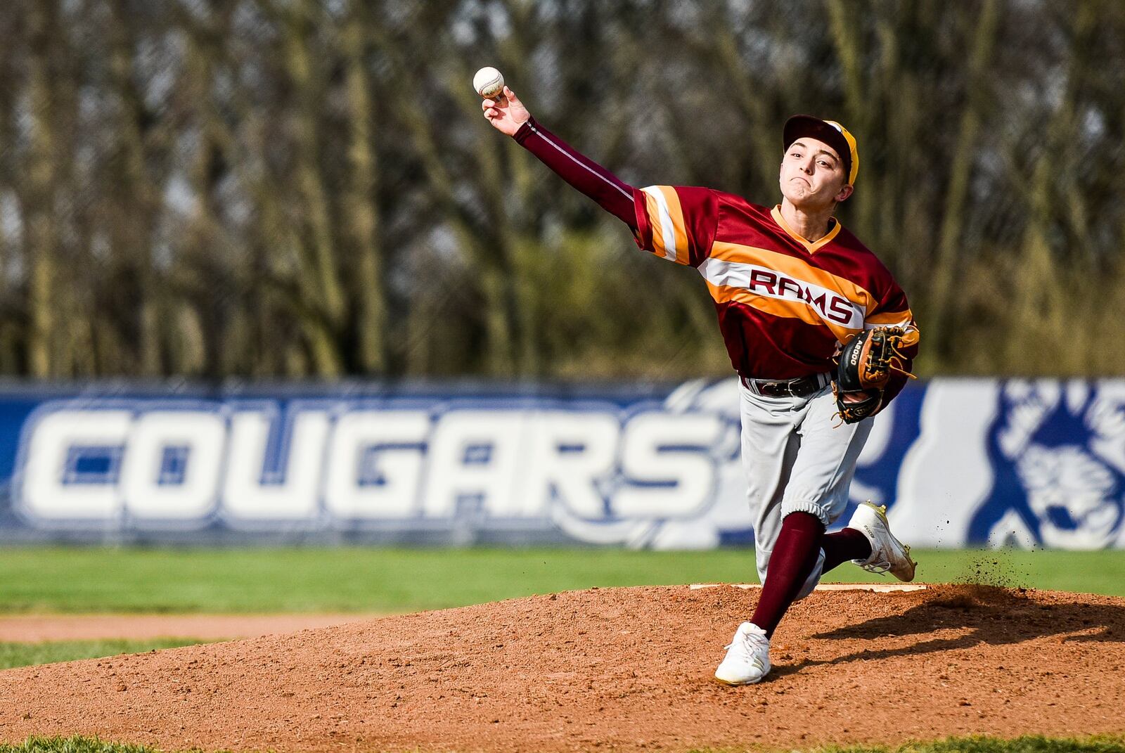 Paul Schroeder of Ross delivers a pitch during Wednesday’s game against host Edgewood in St. Clair Township. NICK GRAHAM/STAFF