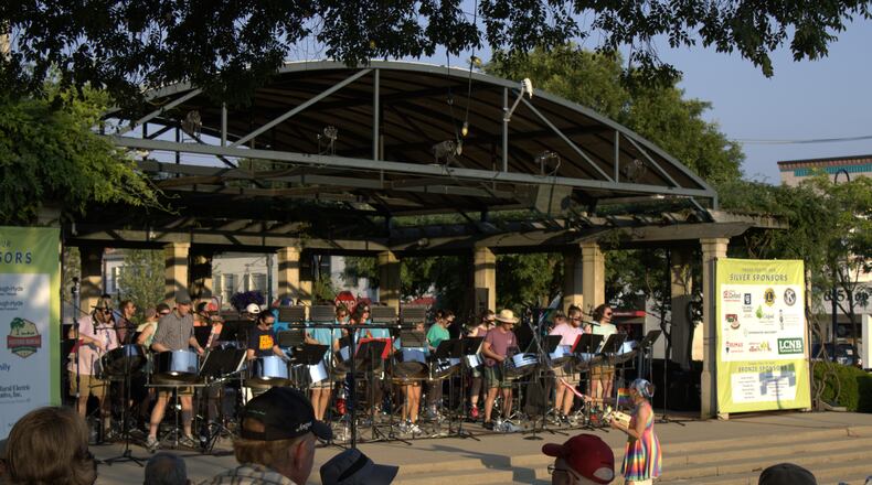Oxford residents danced while Miami University's Steel Band played in Oxford's Memorial Park. Some residents had on pride shirts and held pride flags while they enjoyed the night.