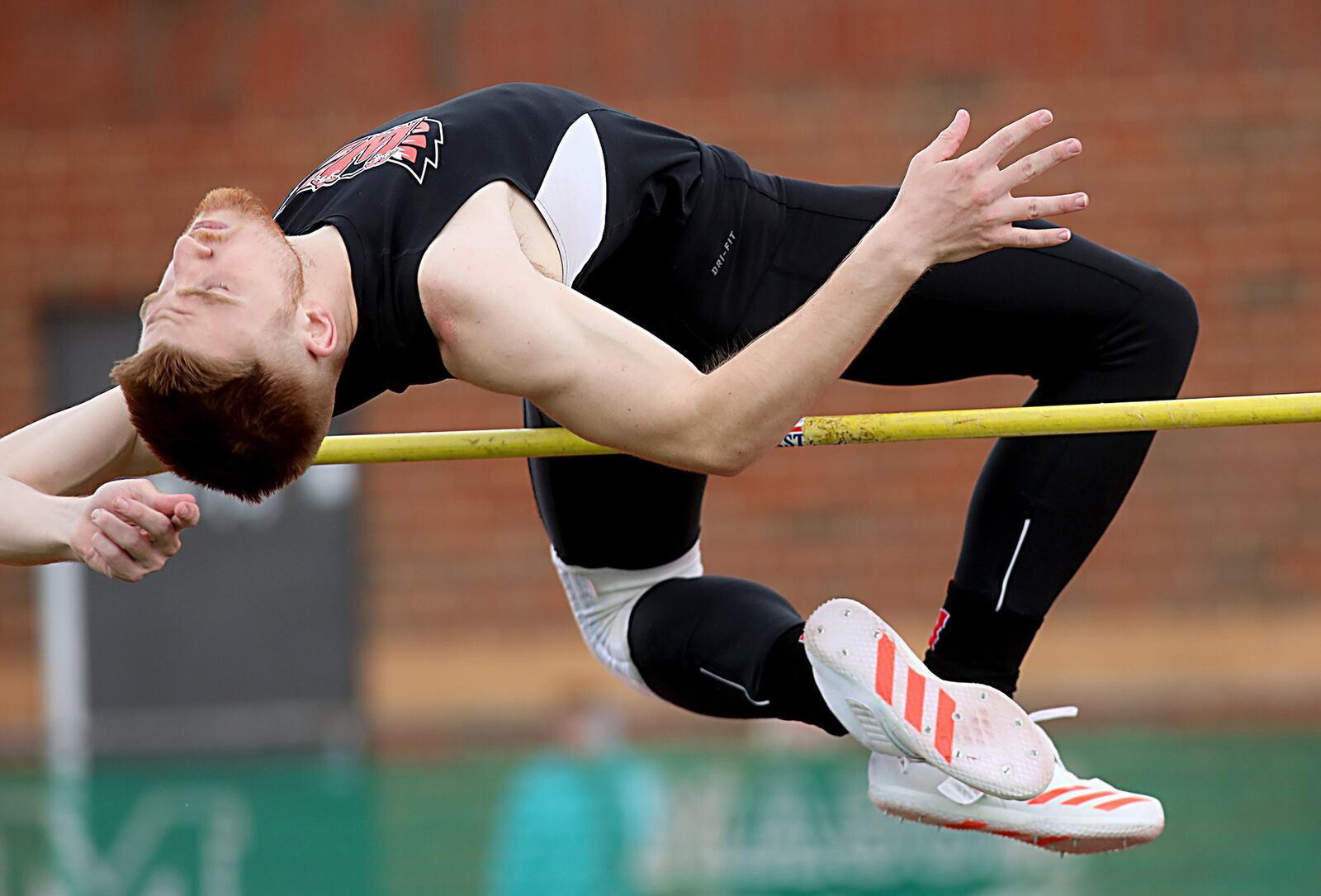 Lakota West’s Logan Curington competes in the high jump during the Greater Miami Conference track & field meet on Dwire Field at Atrium Stadium in Mason on Friday. CONTRIBUTED PHOTO BY E.L. HUBBARD