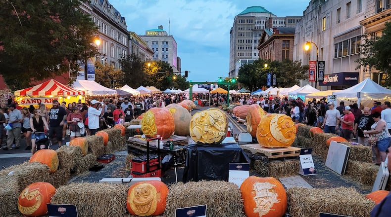 High Street was closed down and lined with vendors, food trucks, rides, games, pumpkins and more for visitors to enjoy Saturday, Oct. 9, 2021 at Operation Pumpkin in downtown Hamilton. NICK GRAHAM / FILE