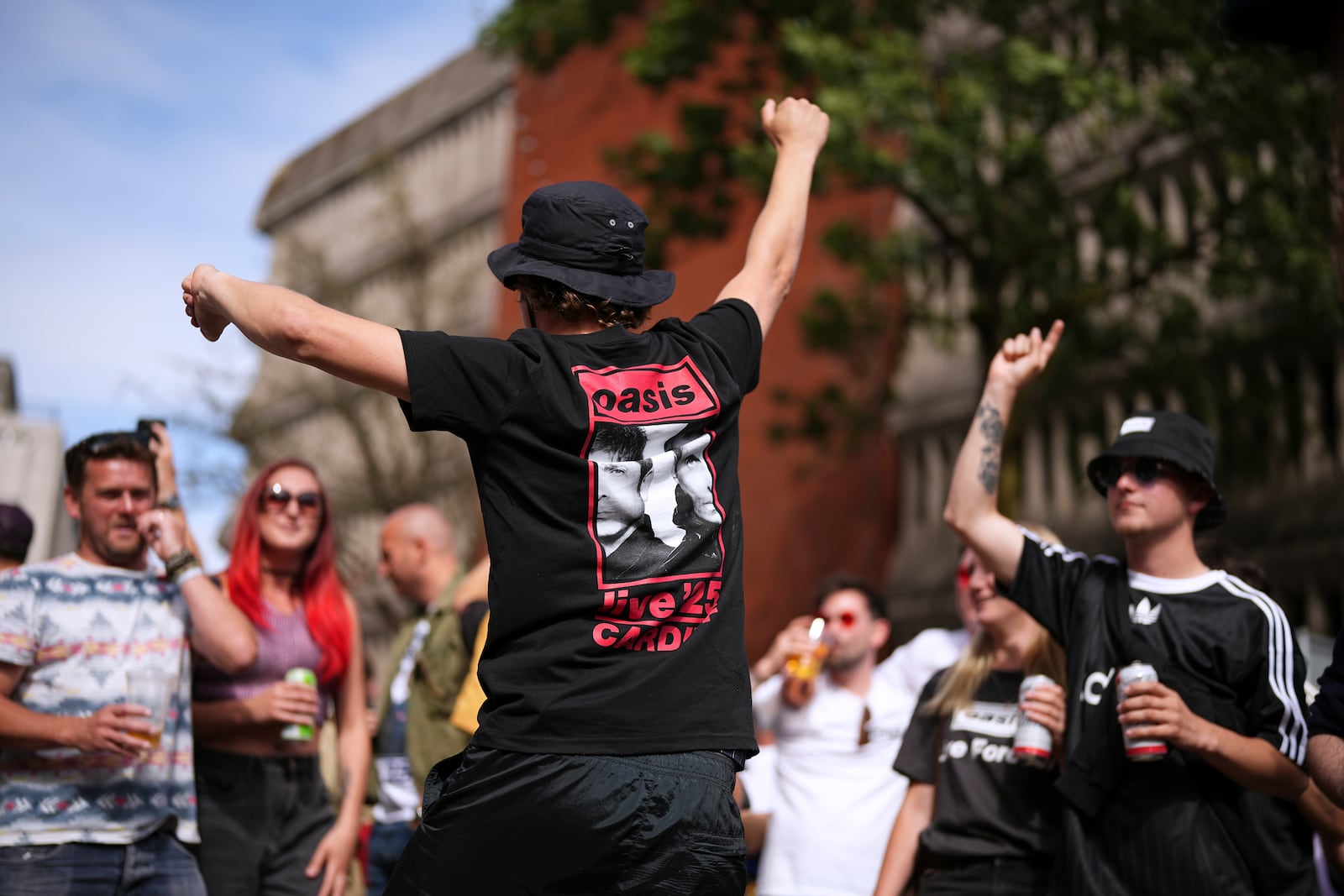 Fans gather for the Oasis reunion concert on Friday, July 4, 2025, in Cardiff. (Photo by Scott A Garfitt/Invision/AP)