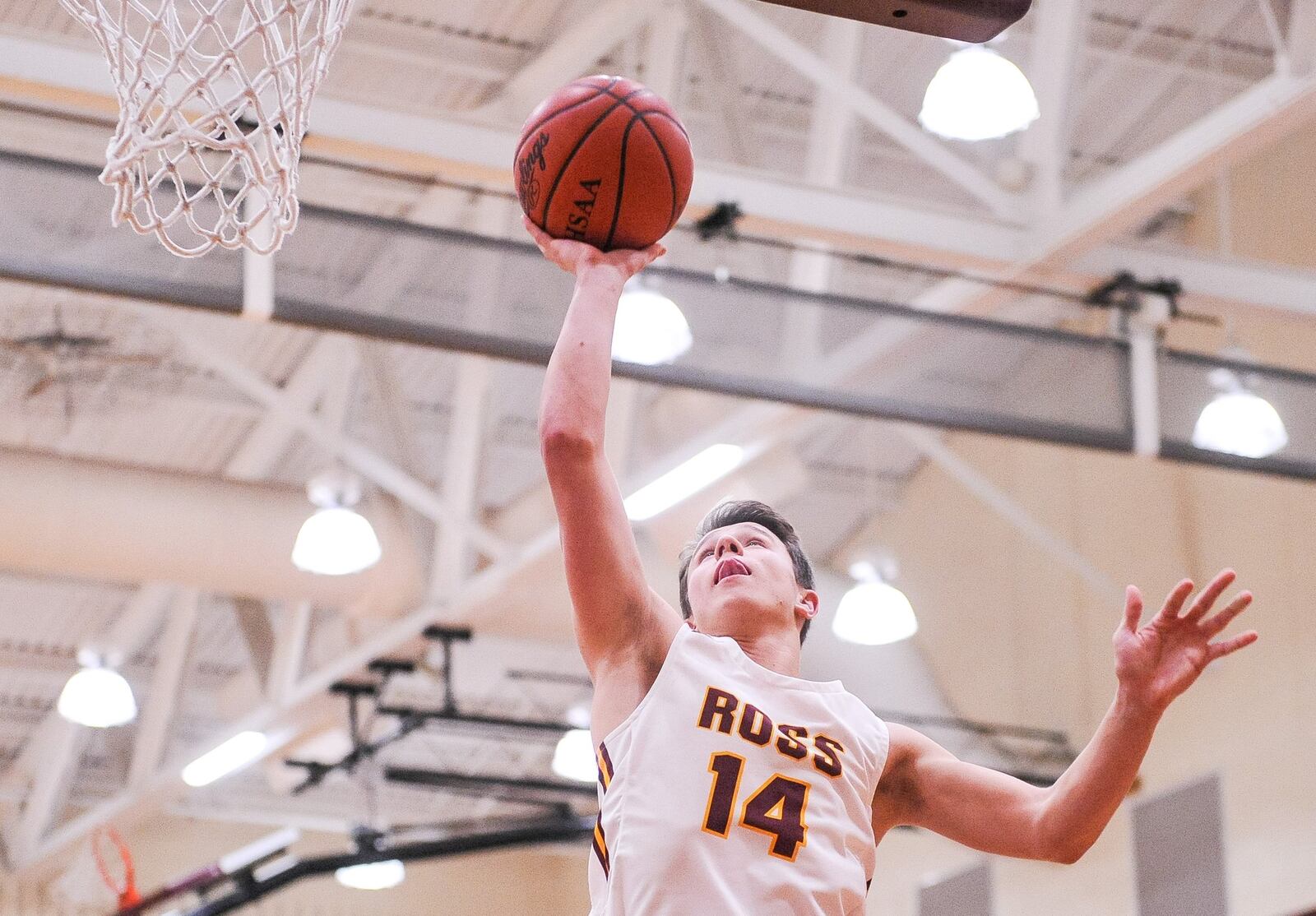 Cooper Shields from Ross goes to the hoop during Tuesday night’s 65-46 loss to visiting Mount Healthy. NICK GRAHAM/STAFF