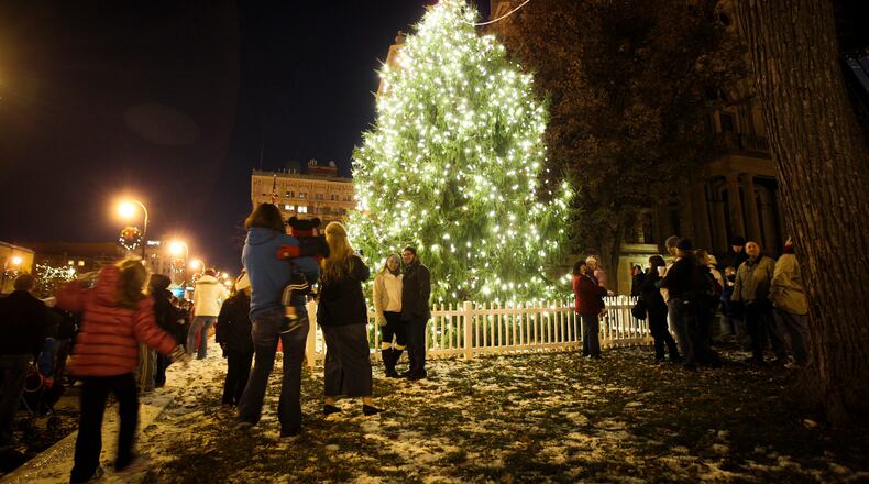 The City of Hamilton held their annual tree lighting ceremony at the historic Butler County Courthouse, Friday, Nov. 21, 2014. GREG LYNCH / STAFF