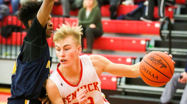 Fenwick forward C.J. Napier (22) drives the lane during a game against visiting Monroe on Jan. 17, 2017. GREG LYNCH/STAFF