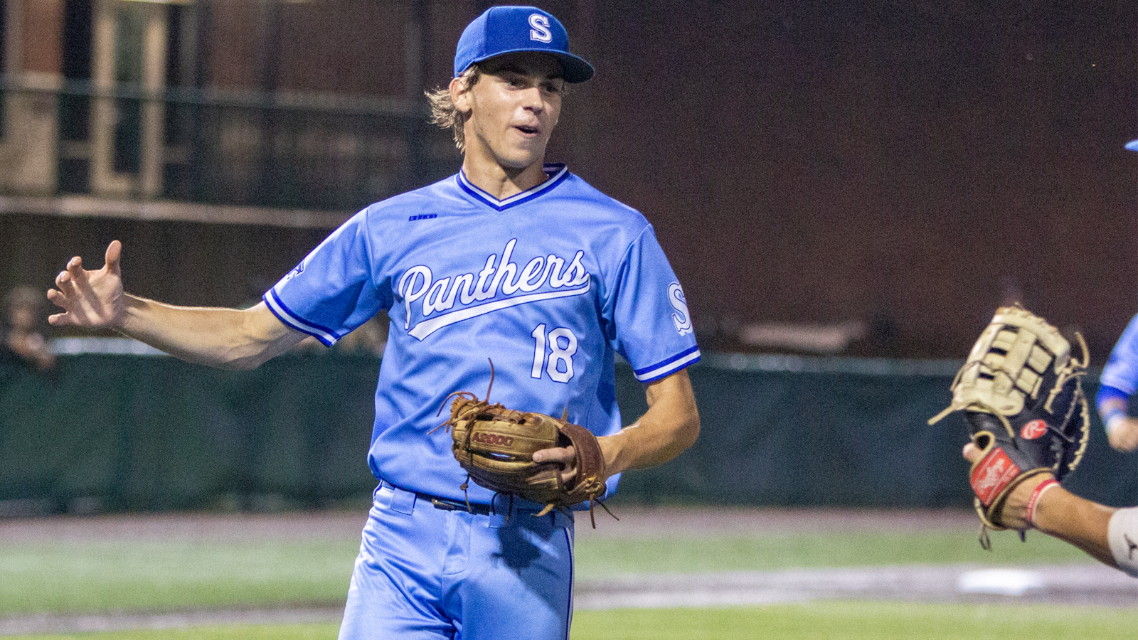 Springboro pitcher Jacob Rhinehart is pumped after entering the game in the fourth inning and getting out of a jam with no runs. Jeff Gilbert/CONTRIBUTED