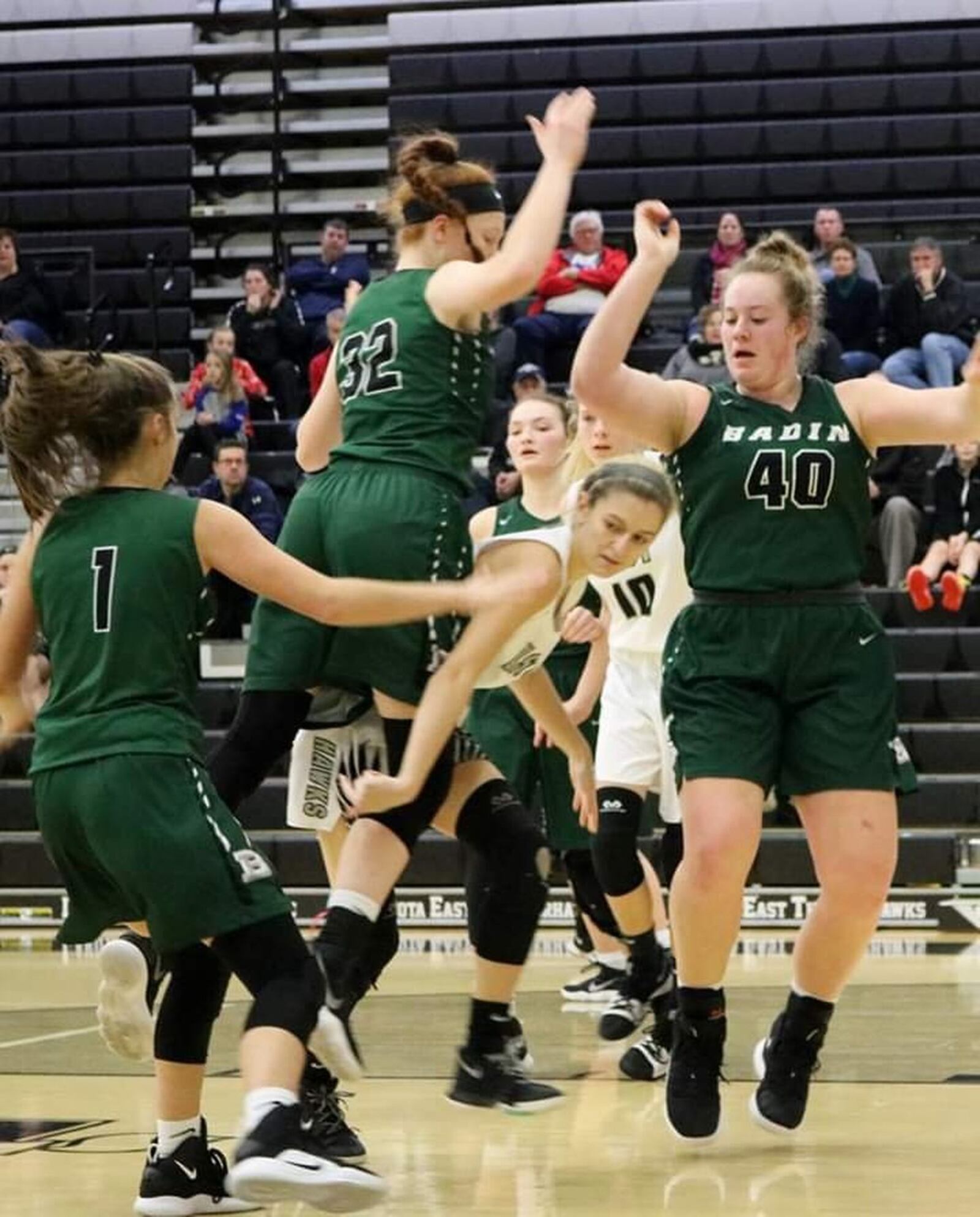 Badin’s Claire MacGowan (1), Mickayla Kowalski (32) and Emma Broermann (40) have their defensive skills on display during a 53-38 basketball win at Lakota East on Dec. 20, 2018. CONTRIBUTED PHOTO BY TERRI ADAMS