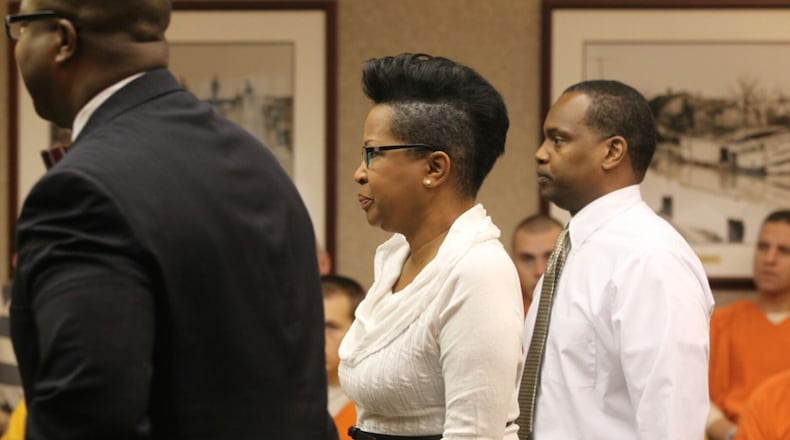 Lisa and Cleveland Cox pleaded not guilty today to one count each of nonsupport of dependent, a first-degree misdemeanor, for allegedly abandoning their nine-year-old son by turning him back over to Butler County Children Services around Oct. 24. GREG LYNCH/STAFF