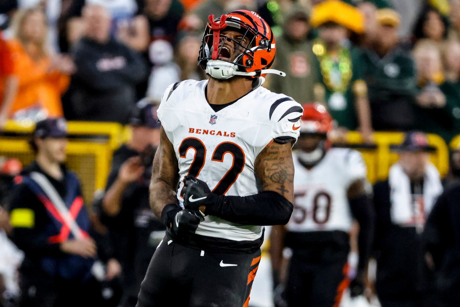 Cincinnati Bengals safety Geno Stone (22) celebrates his sack on Green Bay Packers quarterback Jordan Love in the second half of an NFL football game, Sunday, Oct. 12, 2025, in Green Bay, Wis. (AP Photo/Mike Roemer)