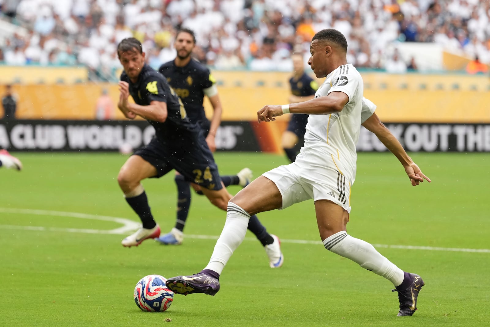Real Madrid's Kylian Mbappe in action during the Club World Cup round of 16 soccer match between Real Madrid and Juventus in Miami Gardens, Fla., Tuesday, July 1, 2025. (AP Photo/Rebecca Blackwell)