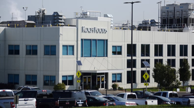 Pictured is the primary building at Koch Foods on Port Union Road in Fairfield. The company is growing closer to completing its 400,000-square-foot expansion of its chicken processing facility on the backside of the campus. The company plans to hire 400 new jobs when it opens the new processing lines in February 2023, though some leadership position hiring is currently happening. The total project is $220 million, with $140 million spent on the new building. The remaining $80 million will be invested in new machinery and equipment. MICHAEL D. PITMAN/STAFF