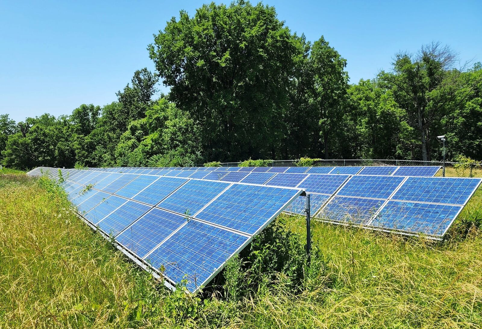 Butler County Commissioners have been asked by 12 townships to ban large scale solar and wind farms according to new law. Several residents protested the plan at a public hearing Monday. NICK GRAHAM/STAFF