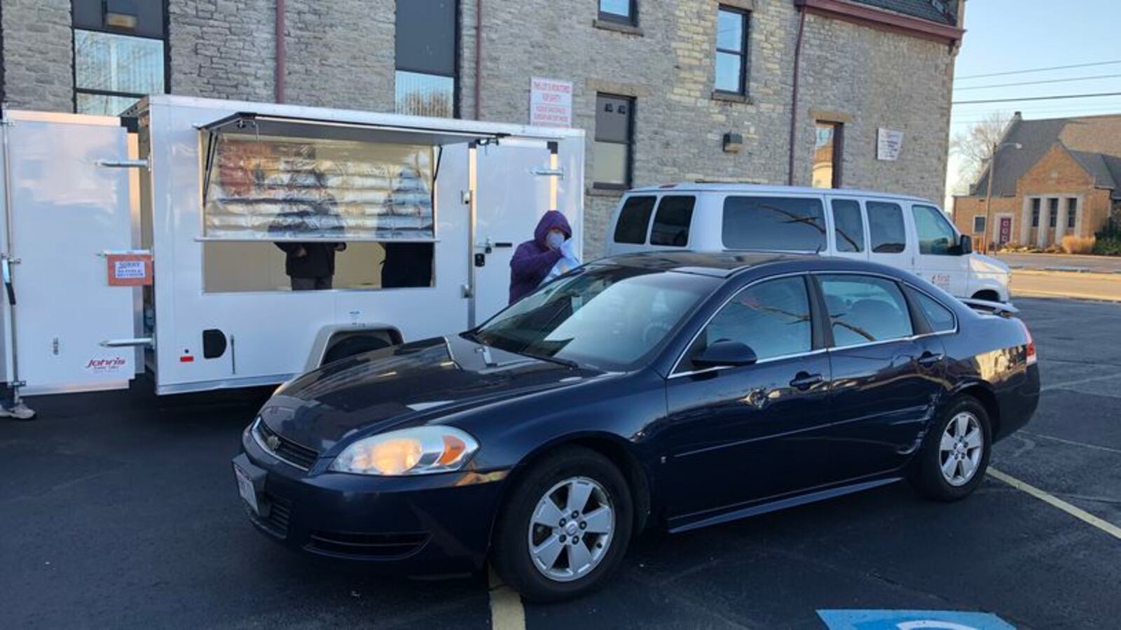 SHALOM volunteers serve homeless people breakfast three days a week from a food trailer at First United Methodist Church. Volunteer coordinator Bill Fugate said SHALOM has seen an increased need for the free meals. FILE PHOTO