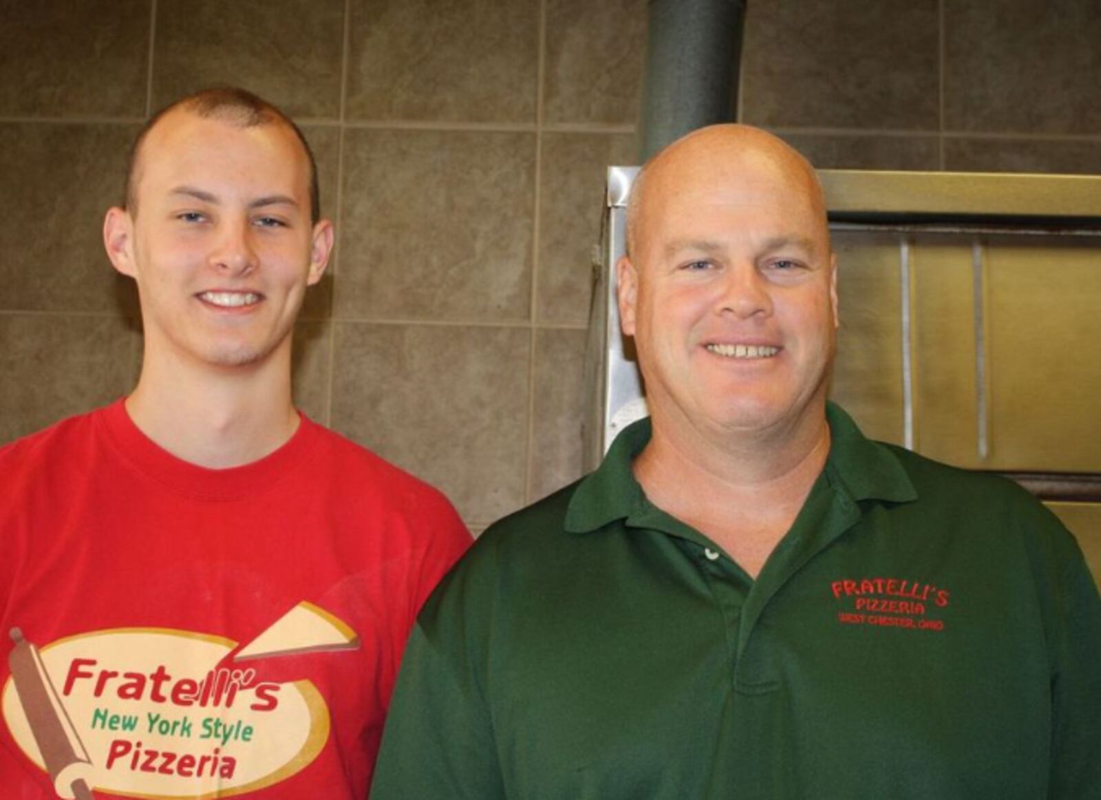 Joey Frederickson, left and Craig Frederickson work together at their family business, Fratelli's Pizzeria, in West Chester Twp. CONTRIBUTED