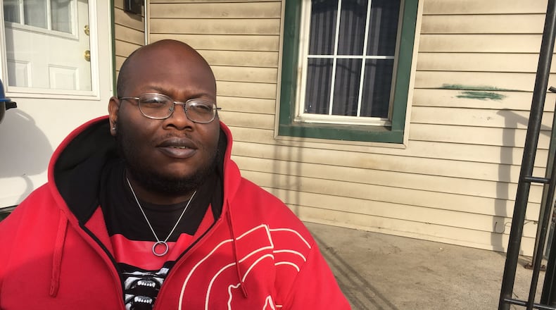 Andre Sanders says he was overwhelmed by the response from the Middletown community after his wife died last year weeks before Christmas. RICK MCCRABB/STAFF