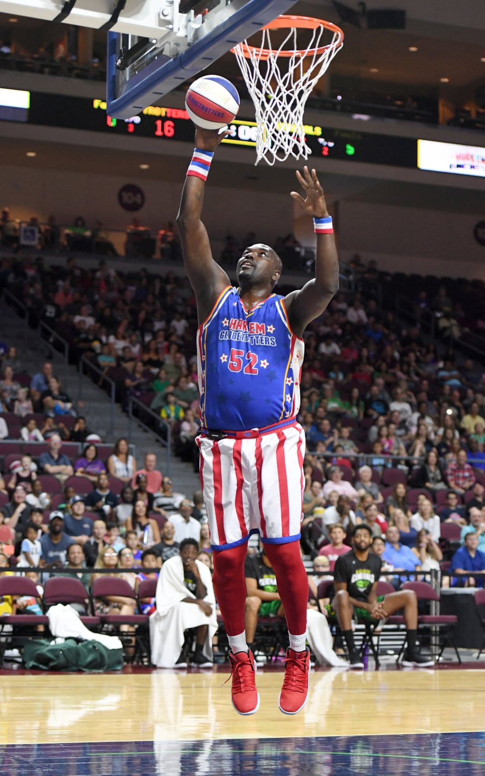 Nate “Big Easy” Lofton #52 of the Harlem Globetrotters shoots a layup during an exhibition game against the Washington Generals at the Orleans Arena on Aug. 25, 2019, in Las Vegas, Nevada. The Globetrotters will return to Dayton for their annual New Year’s Eve event at Wright State’s Nutter Center. (Photo by Ethan Miller/Getty Images)