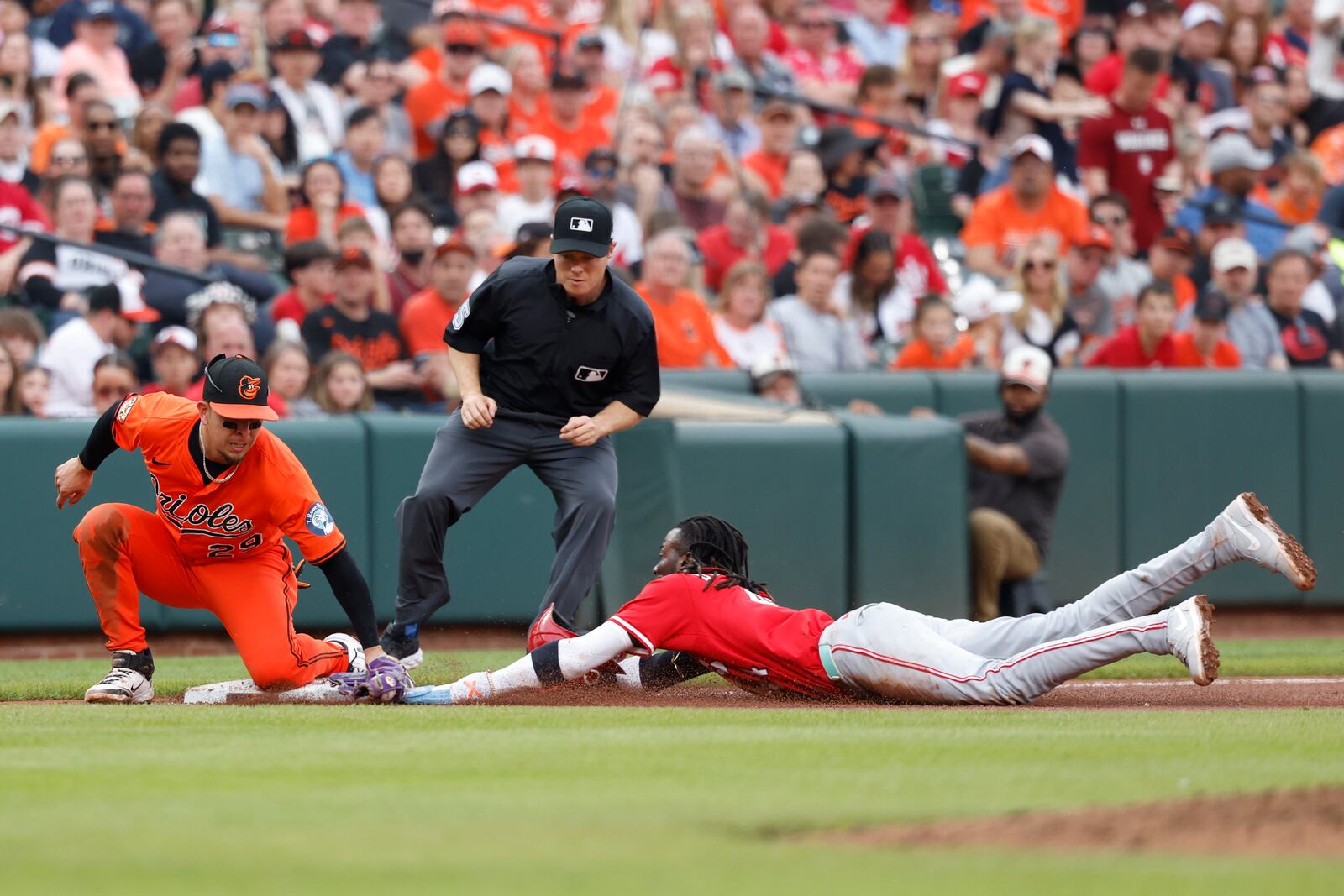 Cincinnati Reds' Elly De La Cruz steals third base in the seventh inning of a baseball game against the Baltimore Orioles, Saturday, April 19, 2025, in Baltimore. (AP Photo/Alyssa Howell)