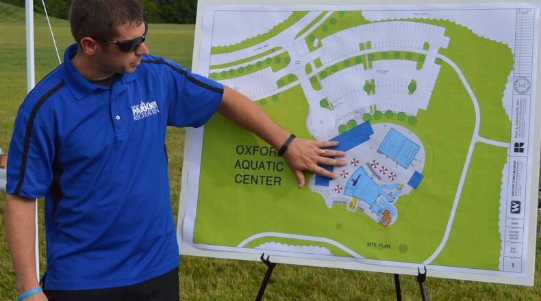 Oxford Director of Parks and Recreation Casey Wooddell describes what will be included in the city’s new aquatic center at a groundbreaking ceremony Aug. 7. CONTRIBUTED/BOB RATTERMAN