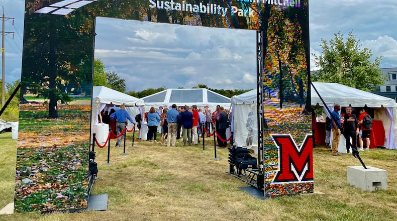 Miami University officials unveiled this week the school’s latest step toward switching its main campus to more sustainable energy with an announcement of a $5 million combined solar energy field and park.
Thanks to the two Miami graduate donors - Sharon and Graham Mitchell – and their $5 million gift toward the project, the school’s Western Campus will sport its first mixed use solar energy park by summer 2025. (Photo by Michael D. Clark/Journal-News)