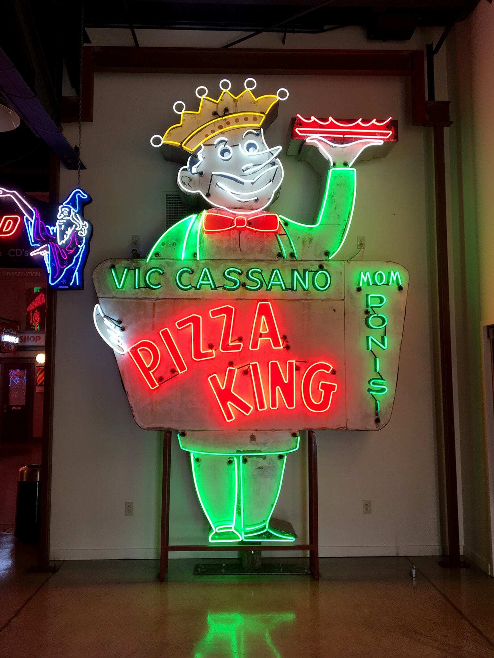 A Vic Cassanos Pizza King porcelain neon sign from the 1950s has been restored and is on display at the American Sign Museum in Cincinnati. The pizza chain was founded in Dayton in 1953 by Cassano and his mother-in-law, Caroline Mom Dinisi. CHRIS STEWART / STAFF