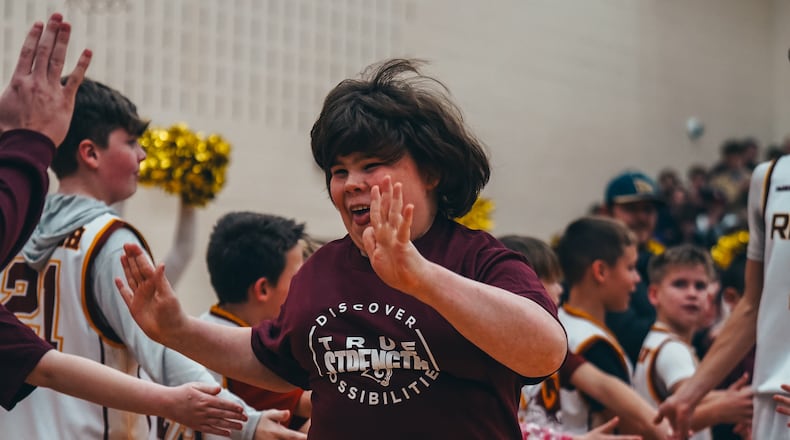 A former local high school football star and now NFL player’s new foundation is sponsoring a series of upcoming events at area high schools to spotlight special needs students. Cleveland Browns’ linebacker Jordan Hicks, a Lakota West High School graduate, has created a non-profit foundation “True Strength Ability Awareness." Pictured is the first pre-game event at Ross High School last year. (Provided by True Strength Ability Awareness)