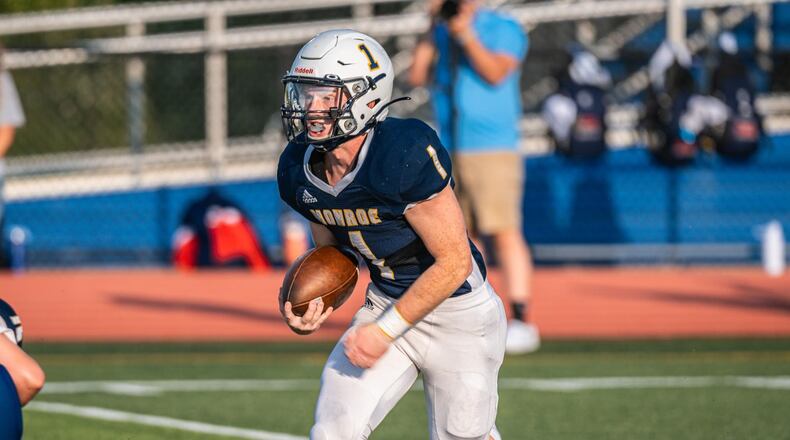 Monroe's Ryan Miles rushes with the football against Talawanda this past season. AJ Fullam/CONTRIBUTED