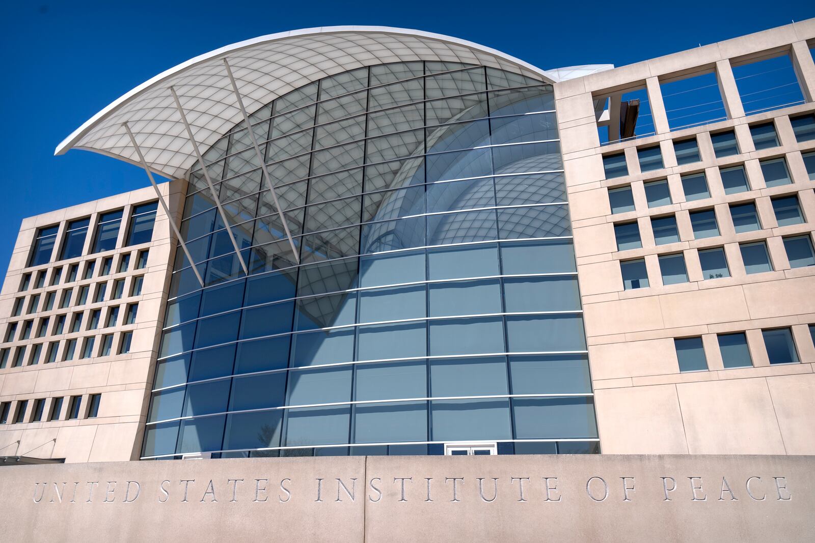FILE - The headquarters of the United States Institute of Peace is seen, March 18, 2025, in Washington. (AP Photo/Mark Schiefelbein, File)